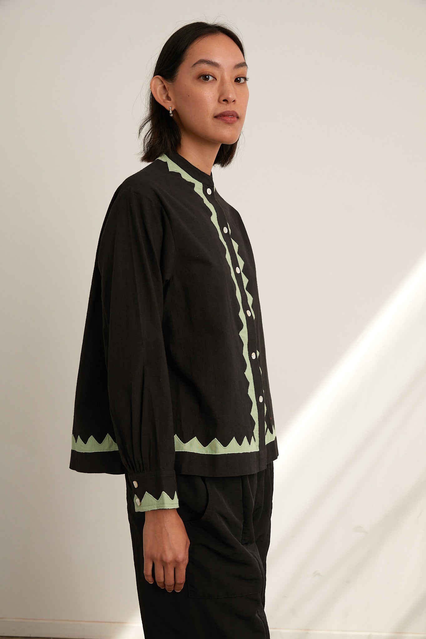 NikkiChasin-zig-zag-applique-shirt-black-grasshopper3.jpg
