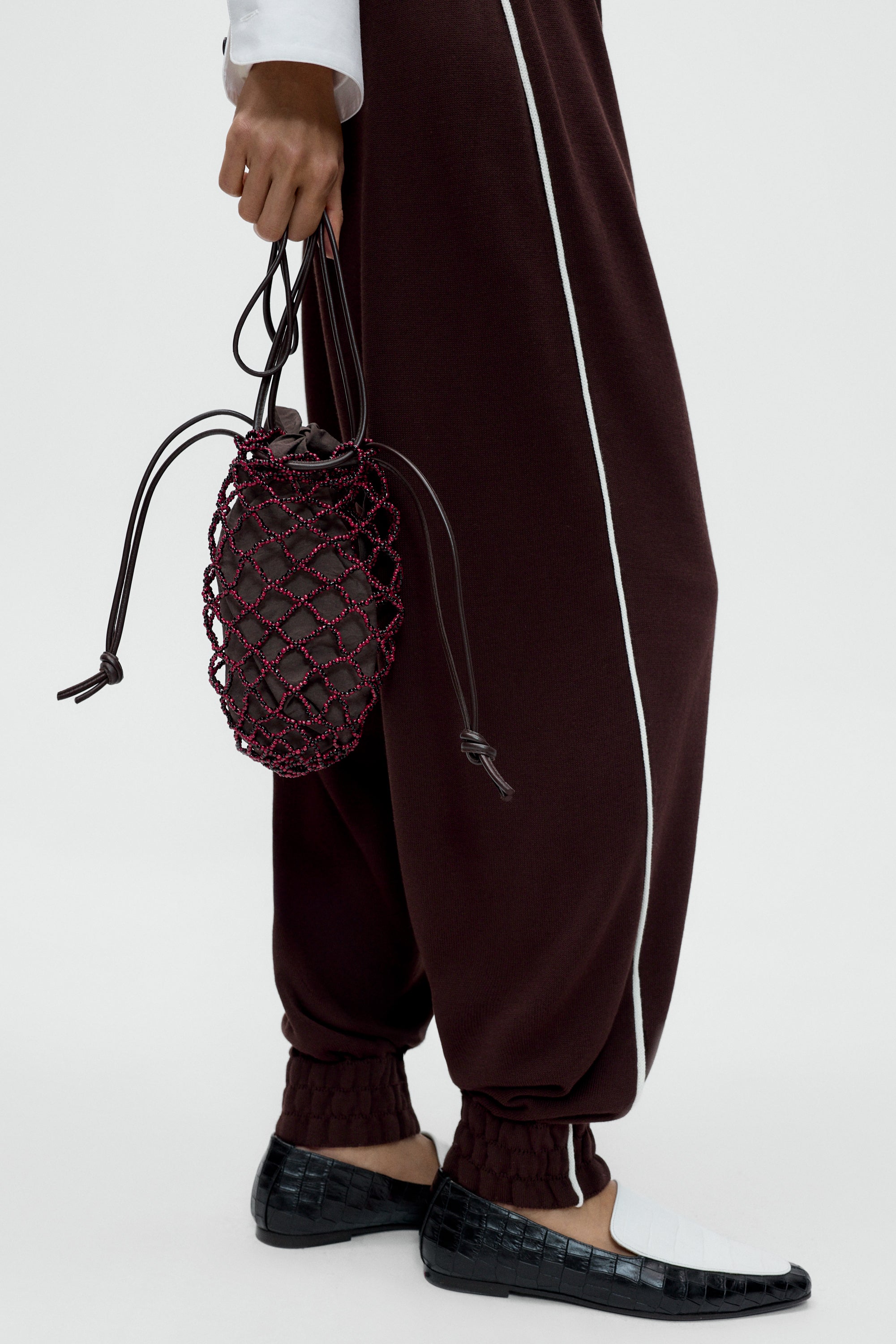 cordera-pre-fall-26-handmade-beaded-net-bag-1.jpg