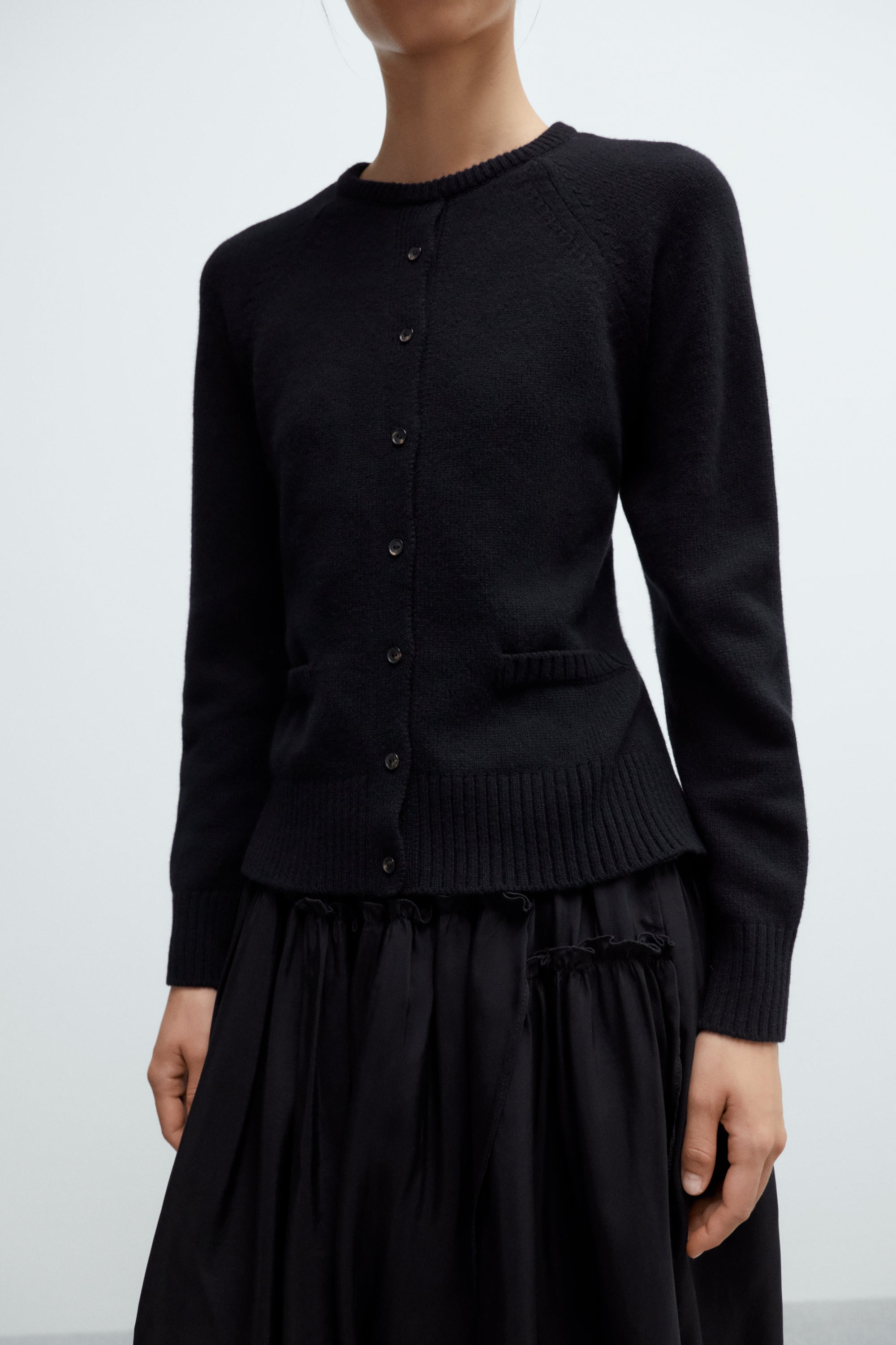 cordera-resort-26-merino-wool-open-back-cardigan-black-1.jpg