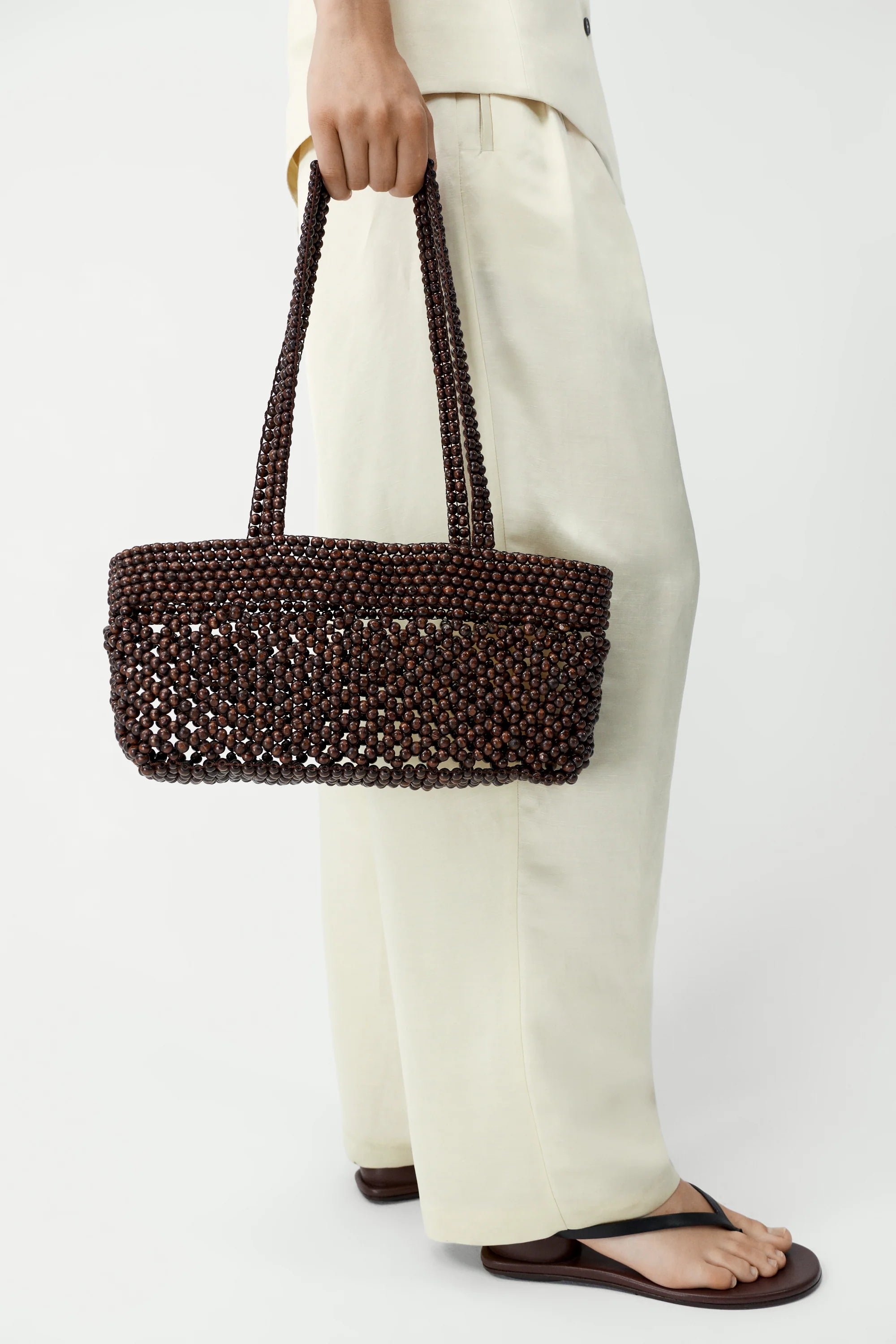 cordera-ss26-wooden-beads-mini-bag-brown-1.webp