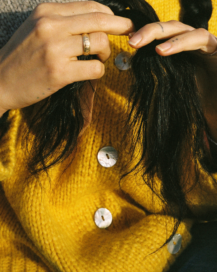 Our signature mother-of-pearl buttons, up close.