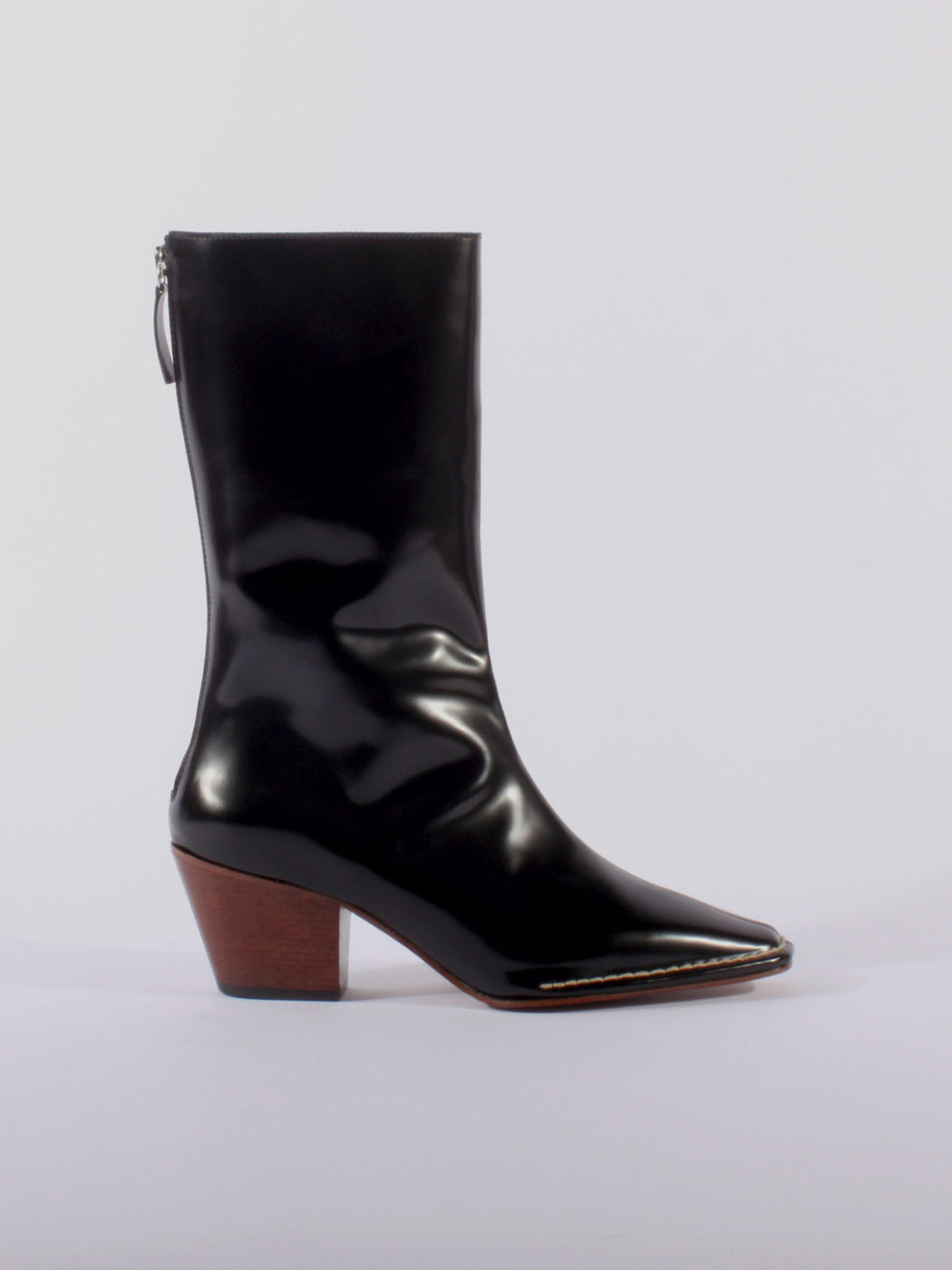 About Arianne Francis Boot- Black